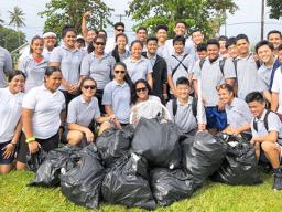 Manumalo Academy students with bags of rubbish collected from Pala Lagoon area
