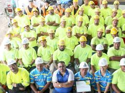 Taupau Tauileave Toluono with the construction staff