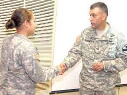 Pfc Theresa Laufasa and officer