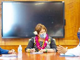 Amata with VA doctors and personnelDirector Sergio S. Chao of the Honolulu Regional Office and VA Clinic Director Dr. Adam Robinson
