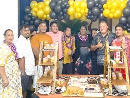 Flora Kelemete-Ma’a (center)