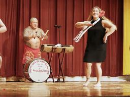 (L-R) Tino Savaiinaea, Chief Sikopu "Scope" Savaiinaea, Katie Savaiinaea-Elisaia and Niko Savaiinaea dance together