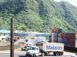 Vehicles streaming out of Port of Pago Pago after tsunami warning issued