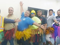 Male Port Admin employees decked out in Halloween "tutus"