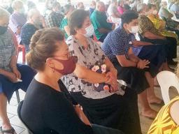 Repatriated residents at church service during quarantine at Tradewinds hotel