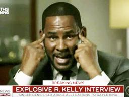 In this frame from video provided by CBS, R. Kelly talks during an interview 