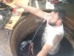 ASPA employee completing the repairs