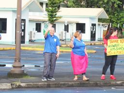 Repatriation passengers at thank you wave