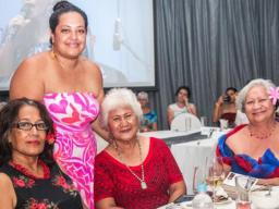 Renata Rivers in pink together with family and friends