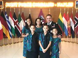 Colonel Filifaiesea Robert Lee Leiato, with his wife and children