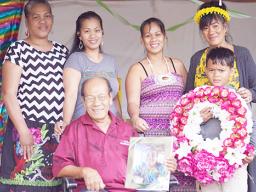 with (back row left to right) Meriuter Mauricio, Brigid Mauricio Fenderson, Maysleen Mauricio and Meulynn Mauricio Kapiriel. Diondra Kirielmo stands next to Rodrigo.