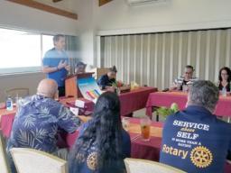 Dr Jean Letarte (seated left) and Chris Fisher (speaking),