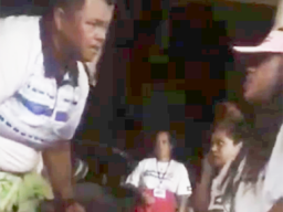 This photo is a screenshot from the video, showing head coach Annie Coffin - who is also a DPS police officer - addressing one of her players, only seconds before she allegedly put her hands on her.