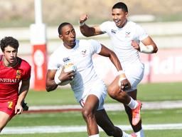 USA's Faitala Talapusi celebrates Perry Baker's line break 