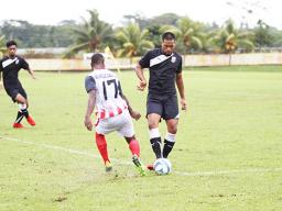 Ryan Samuelu of American Samoa with a successful tackle against