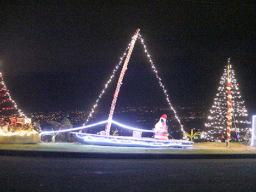 American Samoa Sailing Association’s Santa Claus at the Christmas display on Aoloau mountain 