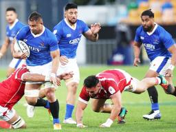 Center Henry Taefu scores a try