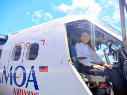Fanaafi Sooaemalelagi, looking at the camera from inside the cockpit of the airline’s aircraft 