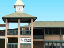 Samoa News clock tower and sign.