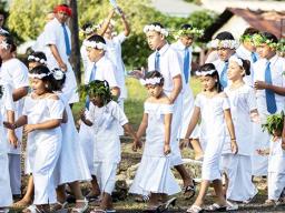 Children parading to White Sunday celebration in Samoa