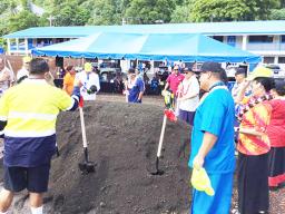Gov. Lolo Matalasi Moliga, along with other ASG officials turning a shovel full of dirt.
