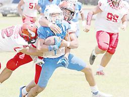 Samoana Sharks ball carrier is brought down near mid field by Joseph Umu (3)