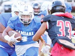 Samoana’s running back breaking out to center field and coming face-to-face with the Marist Crusader defensive backs