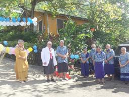 First Lady Cynthia Malala Moliga (left), along with Pastor Willie Solofa and others