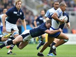  Samoa's Paul Perez (right) is tackled by Scotland's Stuart Hogg 