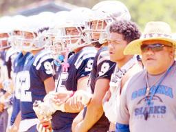 The Samoana sharks on the sidelines during playoff game