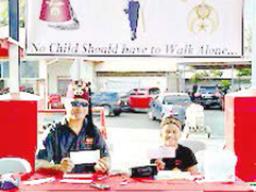 Shrine Club members selling raffle tickets prior to the tournnament