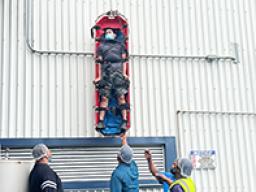 STARKIST training exercise lowering man from second story