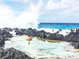 Man in a tide pool in Fitiuta, Manu'a