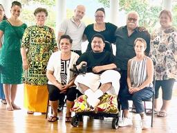 Alofaeleuma Faualo with his new wheel chair and supporters