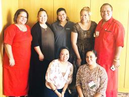 (l-r standing) SPED director Teresa Atuatasi; Part C Program manager Lisa Maga; Part C Program coordinator Roseanne Felise; Part C service coordinator Maelynn Aiono; SPED representative Junella Boat. (l-r kneeling) Part C service coordinator Arlene Taumua, and Part C SSIP coordinator Gloria.