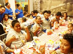 Manulele SPED students enjoying burgers at Carl's Jr.