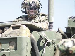 Staff Sgt. Sapa Taala on a tank.