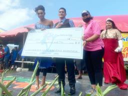 Vaasili Tauvale (far left) and partner Konefesi Talavou (center)