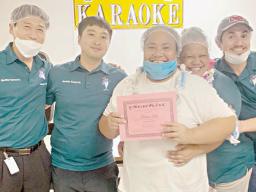  Pictured here is a smiling Toaiva Ueli with management staff, led by Starkist Samoa General Manager Jason Kim.