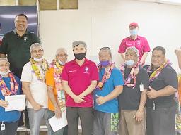 some of their recipients with their supervisors and managers, led by General Manager Jason Kim