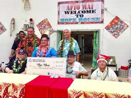 Utagamamao Taisi Steffany and his sister Sina Steffany-Sunia with Hope House residents and board members