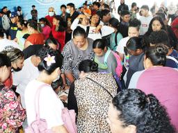 Students and parents at summer school registration