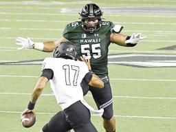 Blessman Ta'ala blocking an opponent