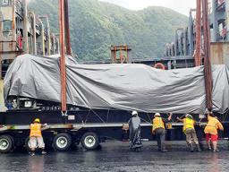 GE generators being unloaded at the port.