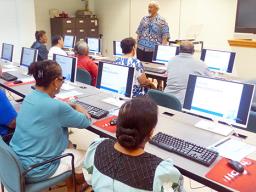 Computer instructor, Loring Fa'iivae (front-standing) of the Feleti Barstow Public Library on Tuesday during the start of the basic computer skills taught class for seniors