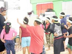 Ms. Faaletaua Saili and Lupelele Elementary students