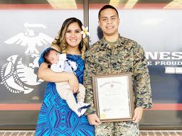SSGT Taumotoi is pictured here with his wife Ejay Schuster, and son, Giannis Benjamin Taumotoi
