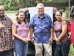 Henry Tavake donating a freezer to Hope House