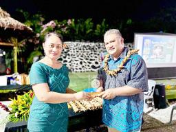 Tavita with award