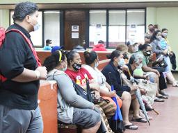 Tax filers wait for their turn at the Tax Office